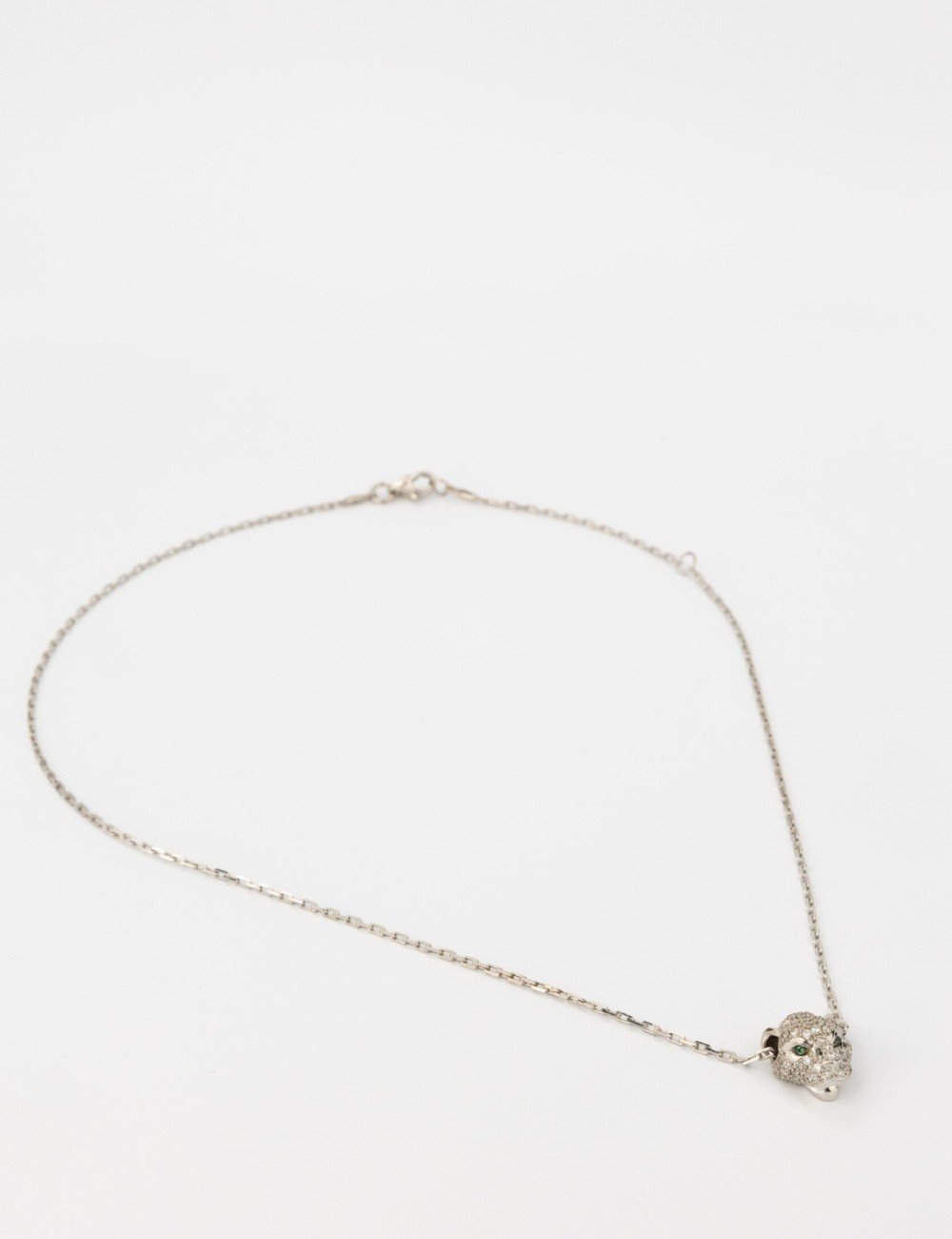 Колье из белого золота c бриллиантами и изумрудом