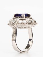 Кольцо из белого золота c бриллиантами и сапфиром