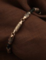 Браслет из золота c кожаным шнурком