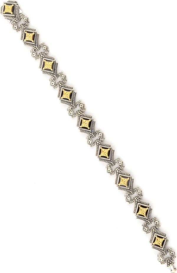 Браслет из серебра 925 пробы и золота 750 пробы c ониксом и рубином