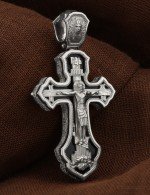 Крест из белого золота c ониксом