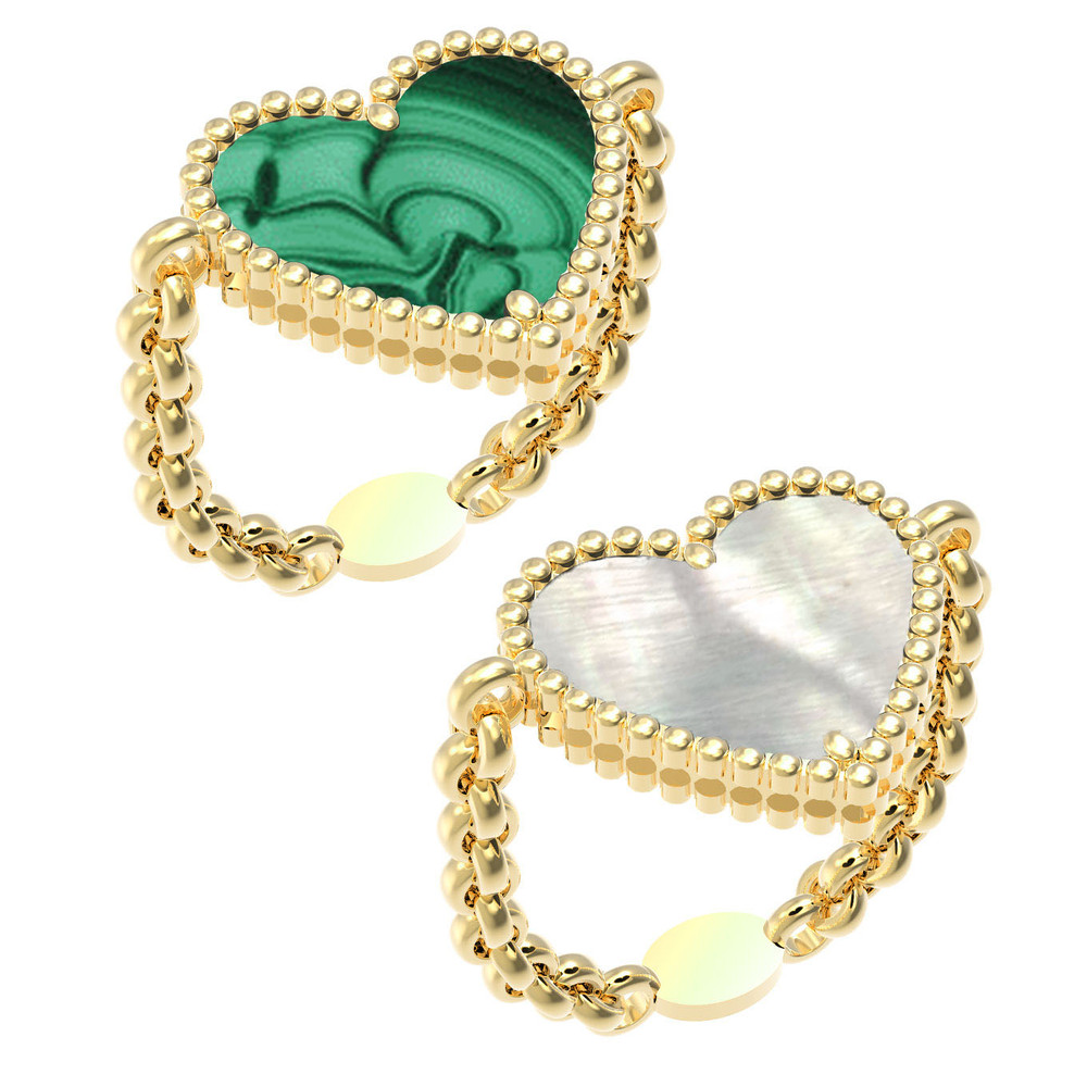 Кольцо из лимонного золота 585 пробы c малахитом и перламутром