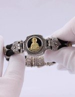 Браслет из серебра 925 пробы и золота 750 пробы c ониксом и шёлковым шнурком