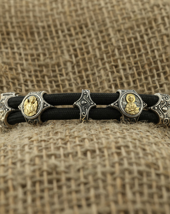 Браслет из серебра 925 пробы и золота 750 пробы c ониксом и шёлковым шнурком