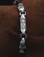 Браслет из белого золота c кожаным шнурком