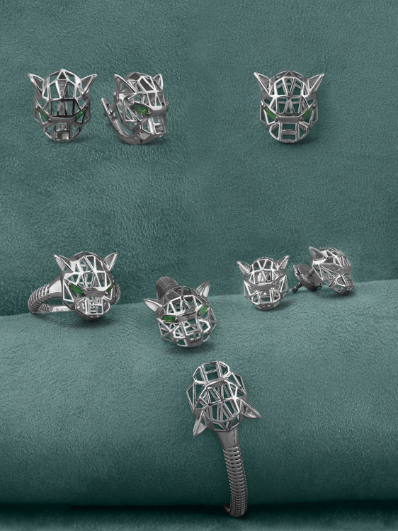 Серьги из белого золота 585 пробы c изумрудом