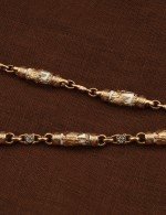 Цепь из золота c эмалью и бивнем мамонта