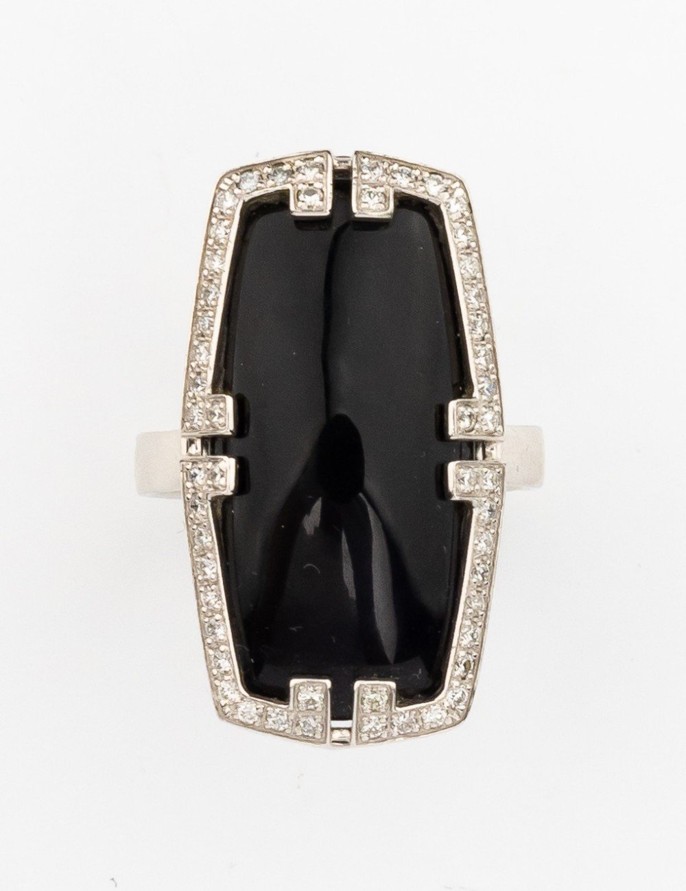 Кольцо из белого золота c бриллиантами, рубином и ониксом