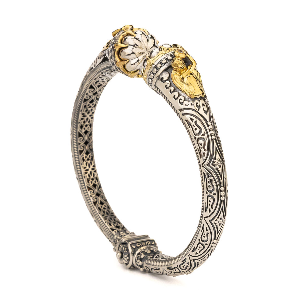 Браслет из серебра 925 пробы и золота 750 пробы c бриллиантами и рубином