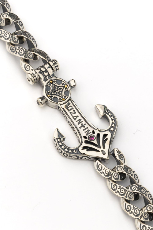 Браслет из серебра 925 пробы и золота 750 пробы c бриллиантами и рубином