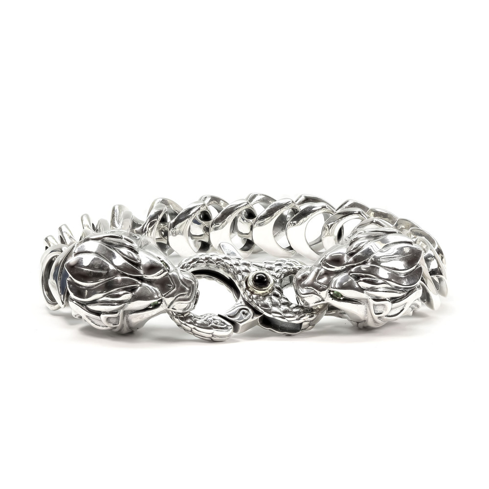 Браслет из серебра 925 пробы и золота 750 пробы c ониксом, изумрудом и рубином