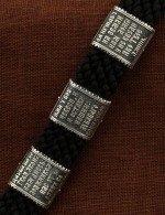 Браслет из серебра 960 пробы и золота 585 пробы c шёлковым шнурком