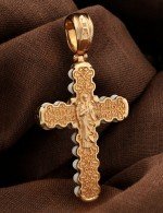 Крест из золота c кахолонгом