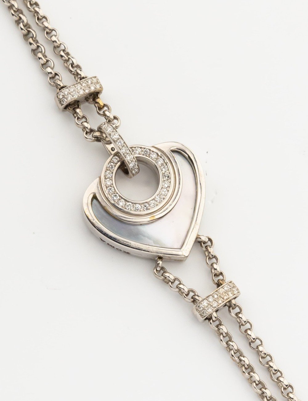 Браслет из белого золота c бриллиантами, ониксом и перламутром