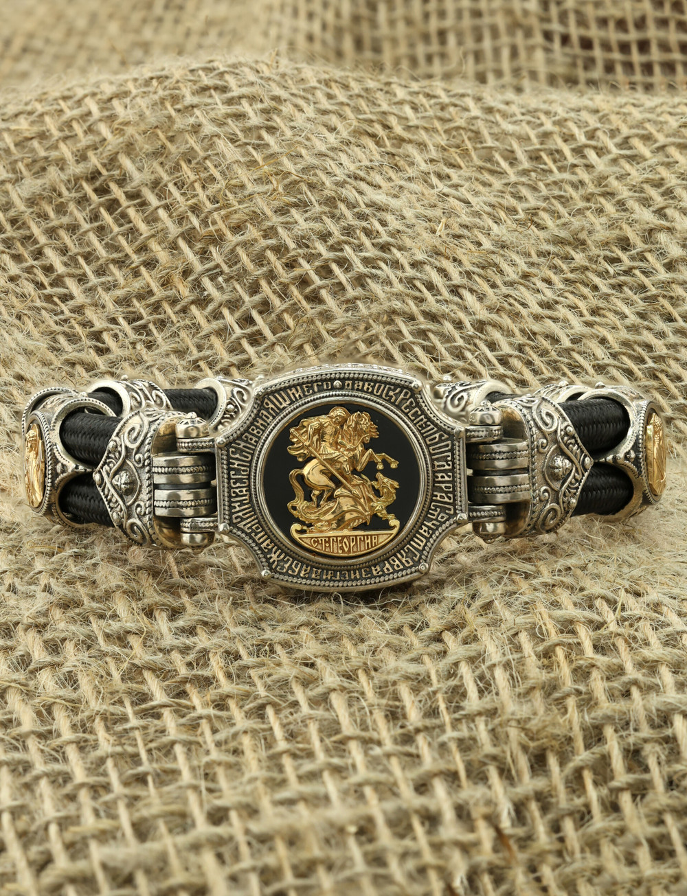 Браслет из серебра 925 пробы и золота 750 пробы c ониксом и шёлковым шнурком