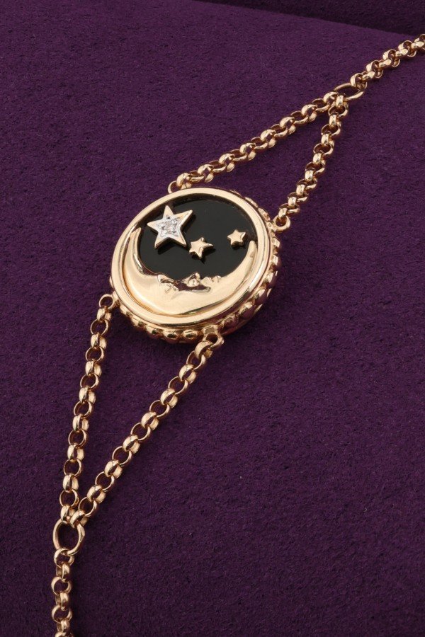 Браслет из золота c бриллиантами, ониксом и перламутром