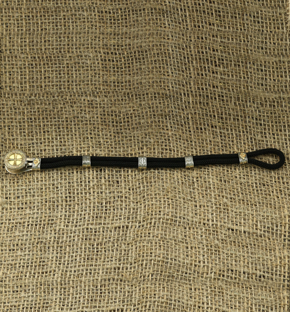 Браслет из серебра 925 пробы и золота 750 пробы c шёлковым шнурком