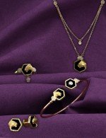 Кольцо из лимонного золота c бриллиантами и ониксом