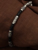 Браслет из белого золота c кожаным шнурком