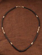 Гайтан из золота c кожаным шнурком