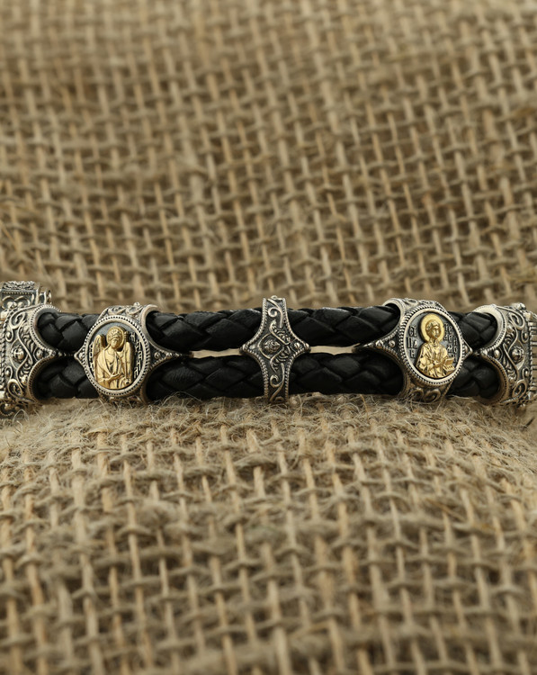 Браслет из серебра 925 пробы и золота 750 пробы c кожаным шнурком и ониксом