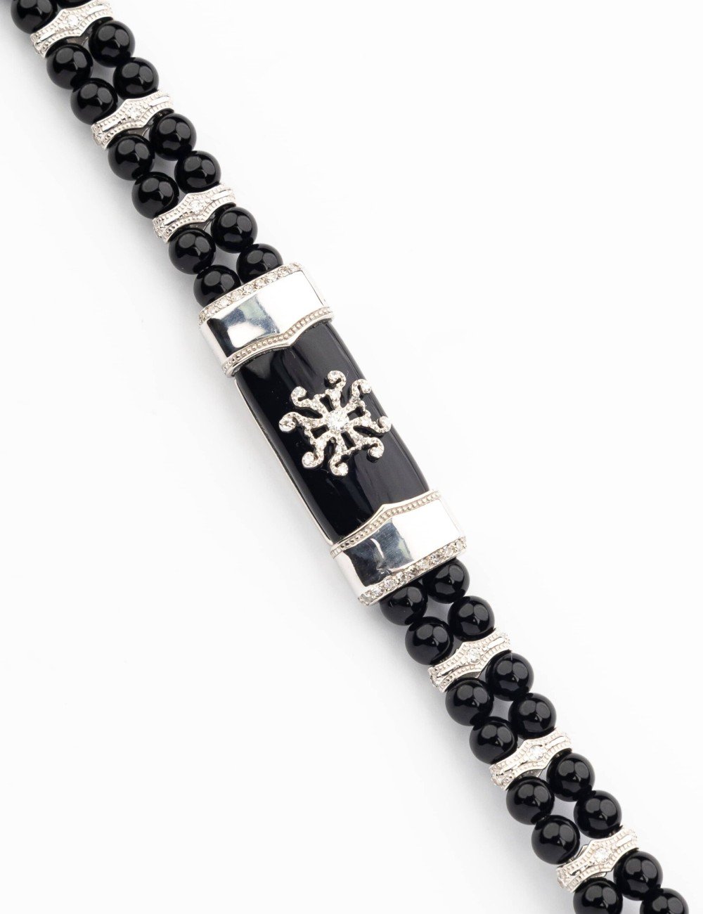 Браслет из белого золота c бриллиантами и ониксом