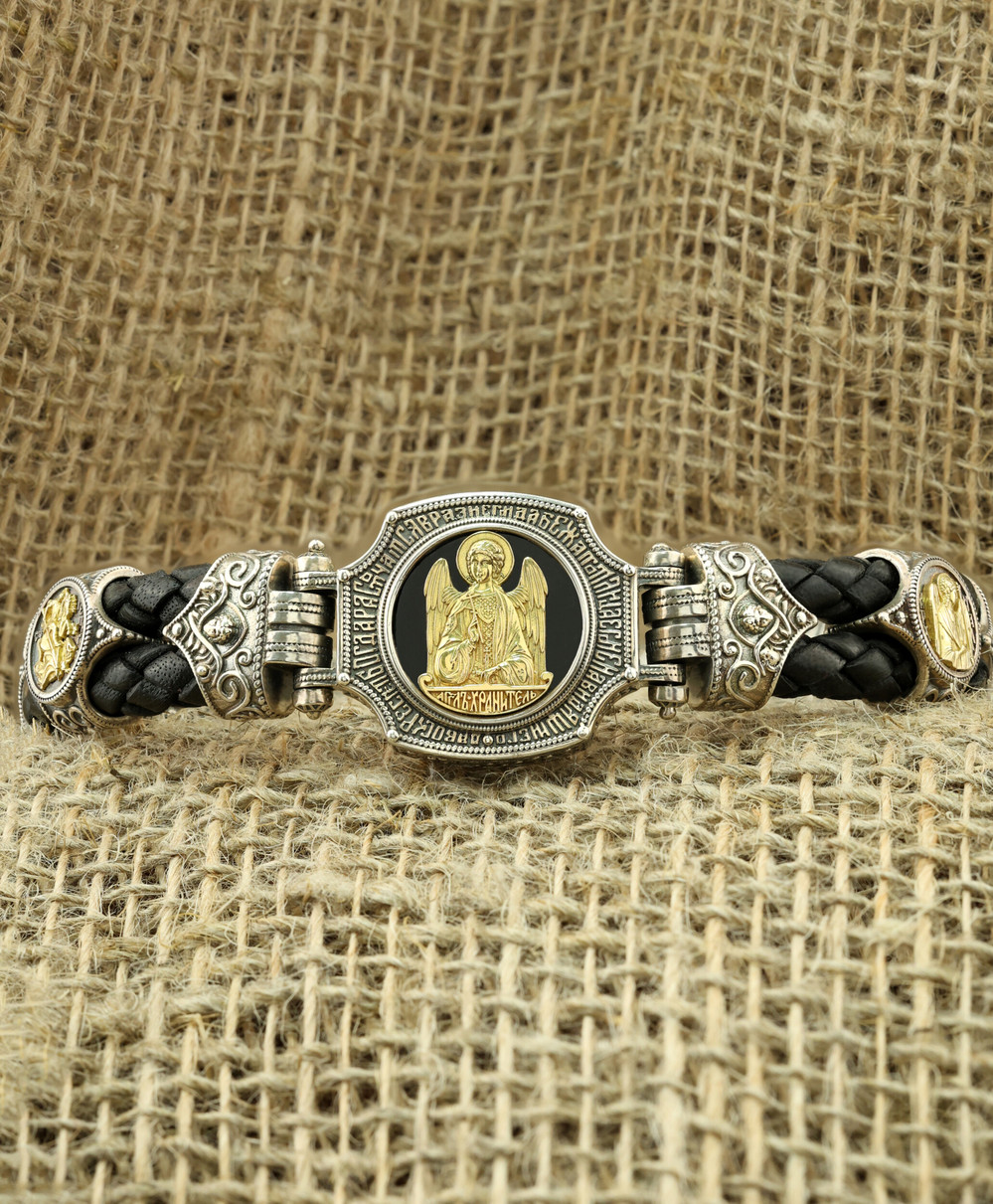 Браслет из серебра 925 пробы и золота 750 пробы c кожаным шнурком и ониксом