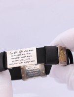 Браслет из серебра 925 пробы и золота 750 пробы c кожаным шнурком