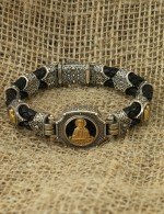 Браслет из серебра и золота c кожаным шнурком и ониксом