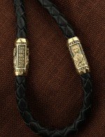 Гайтан из лимонного золота c кожаным шнурком и ониксом