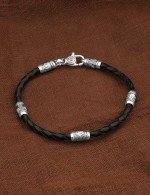 Браслет из белого золота c кожаным шнурком