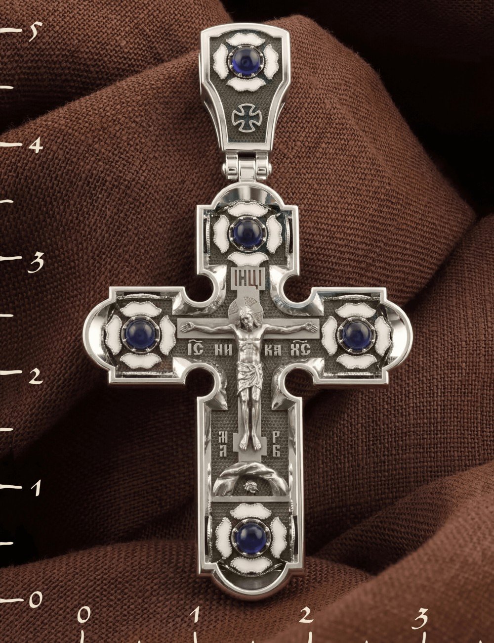Крест из белого золота c эмалью и сапфиром