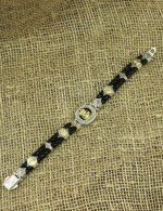 Браслет из серебра и золота c кожаным шнурком и ониксом