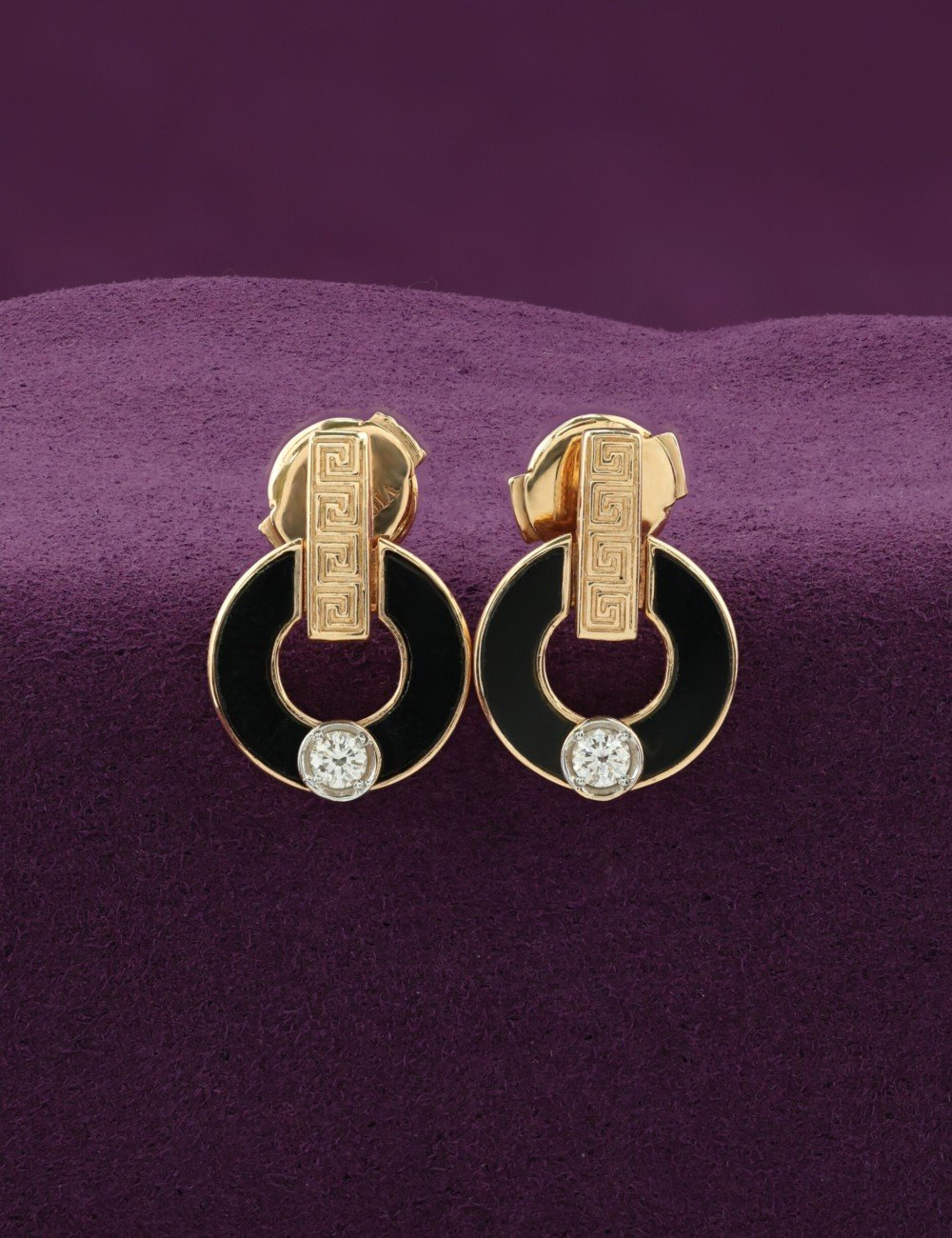 Серьги из золота c бриллиантами и ониксом