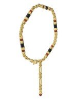 Браслет из лимонного золота c ониксом и кораллом