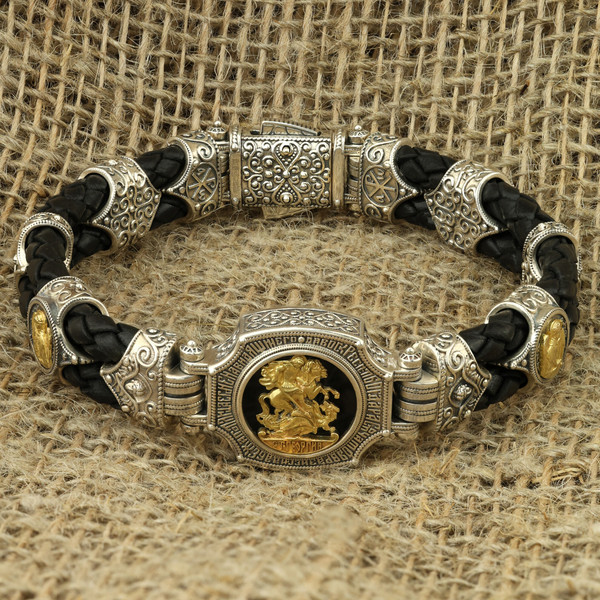 Браслет из серебра 925 пробы и золота 750 пробы c кожаным шнурком и ониксом