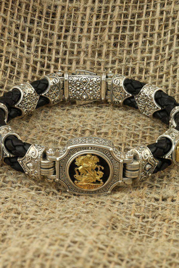 Браслет из серебра 925 пробы и золота 750 пробы c кожаным шнурком и ониксом