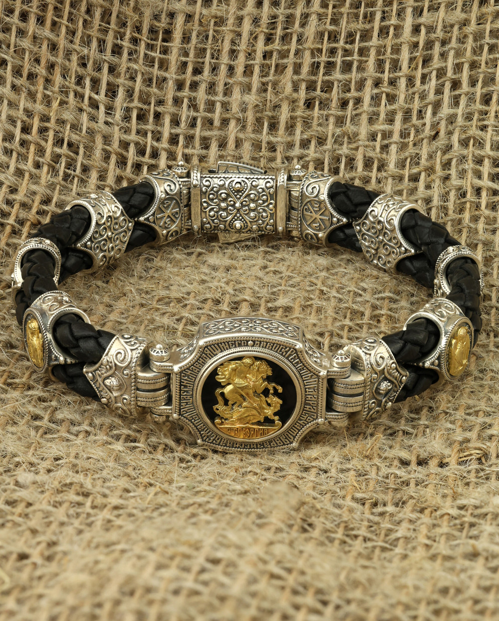 Браслет из серебра 925 пробы и золота 750 пробы c кожаным шнурком и ониксом