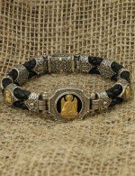 Браслет из серебра и золота c кожаным шнурком и ониксом