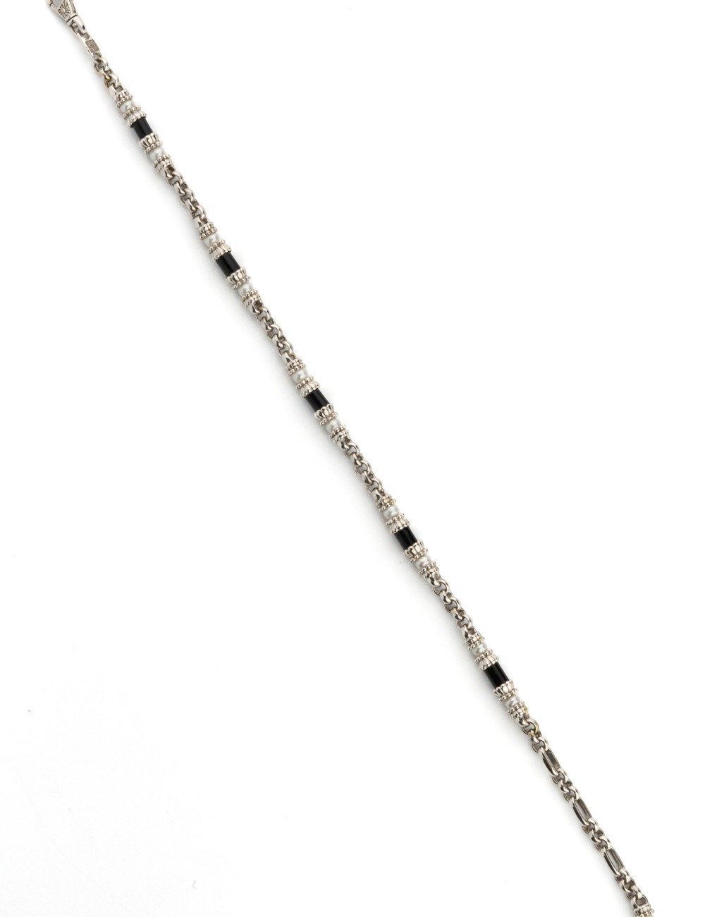 Браслет из белого золота c жемчугом и ониксом