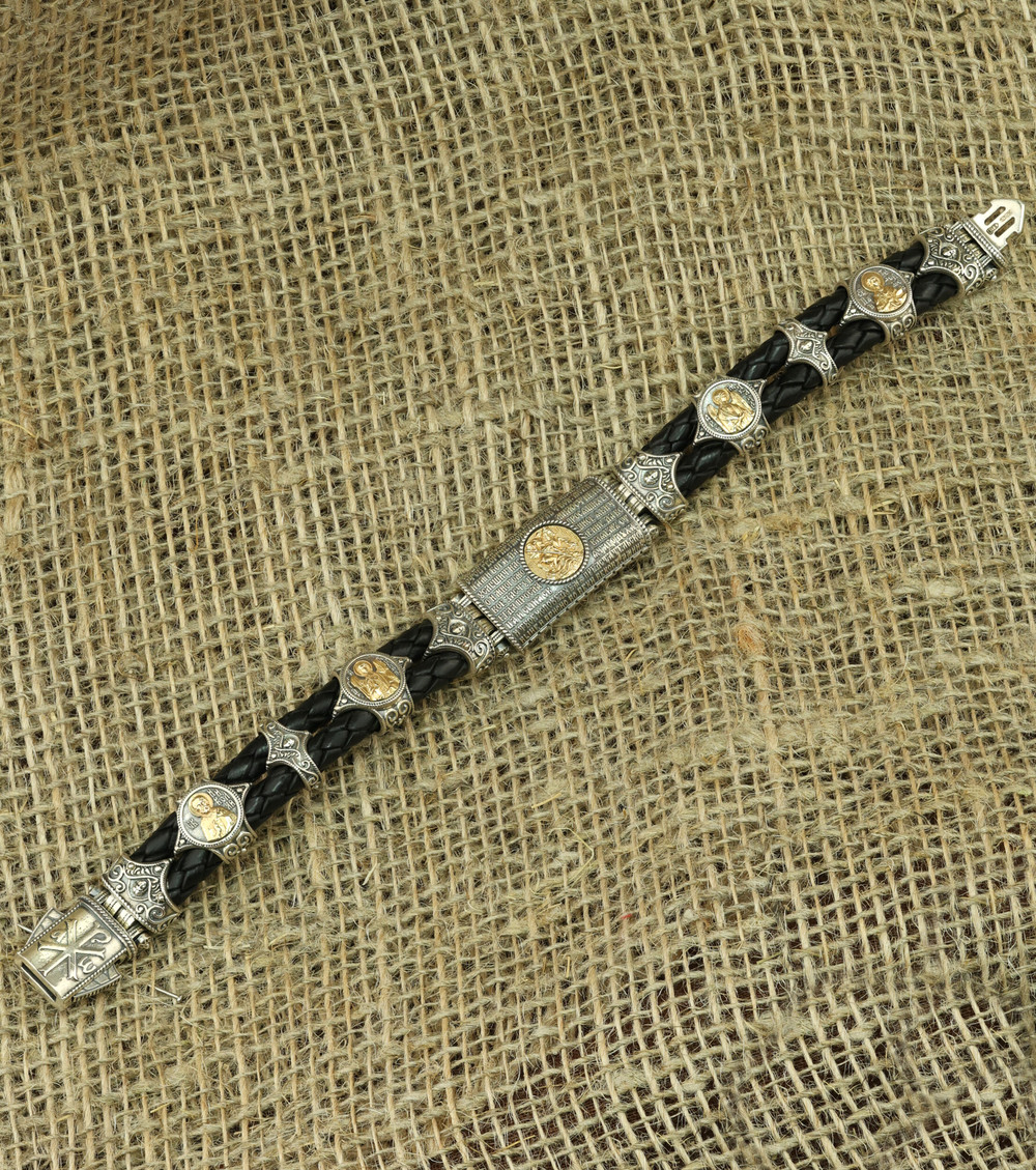 Браслет из серебра 925 пробы и золота 750 пробы c кожаным шнурком