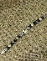 Браслет из серебра и золота c ониксом и шёлковым шнурком