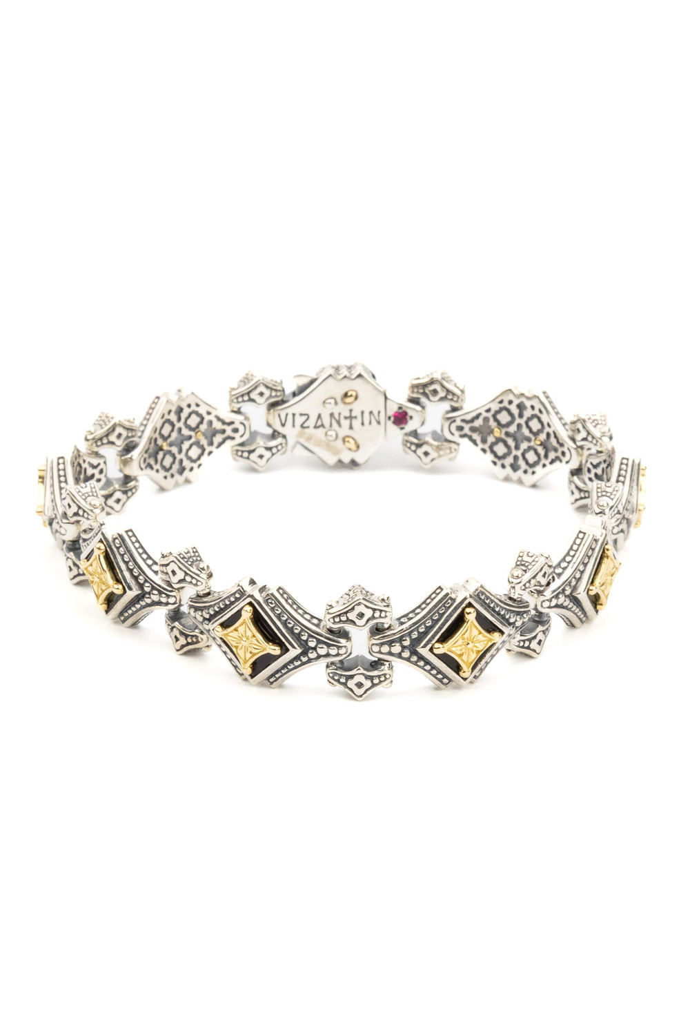 Браслет из серебра 925 пробы и золота 750 пробы c ониксом и рубином