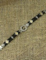 Браслет из серебра и золота c кожаным шнурком и ониксом