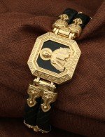 Браслет из лимонного золота c шнурком и ониксом