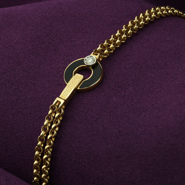 Браслет из лимонного золота 585 пробы c бриллиантами и ониксом