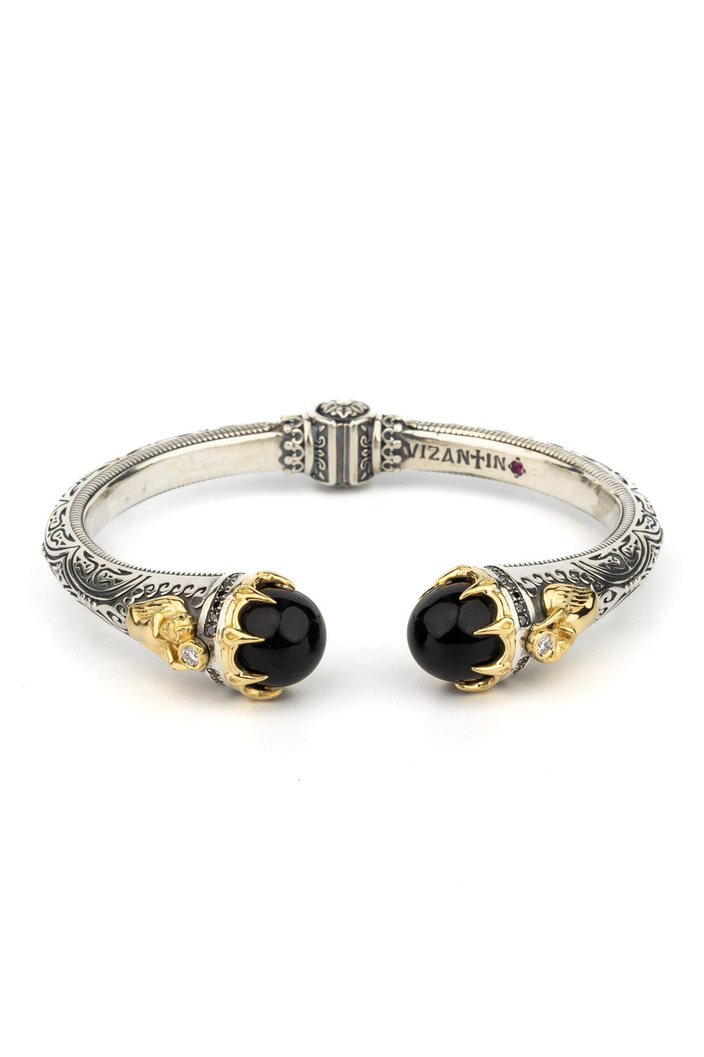 Браслет из серебра 925 пробы и золота 750 пробы c бриллиантами, ониксом и рубином