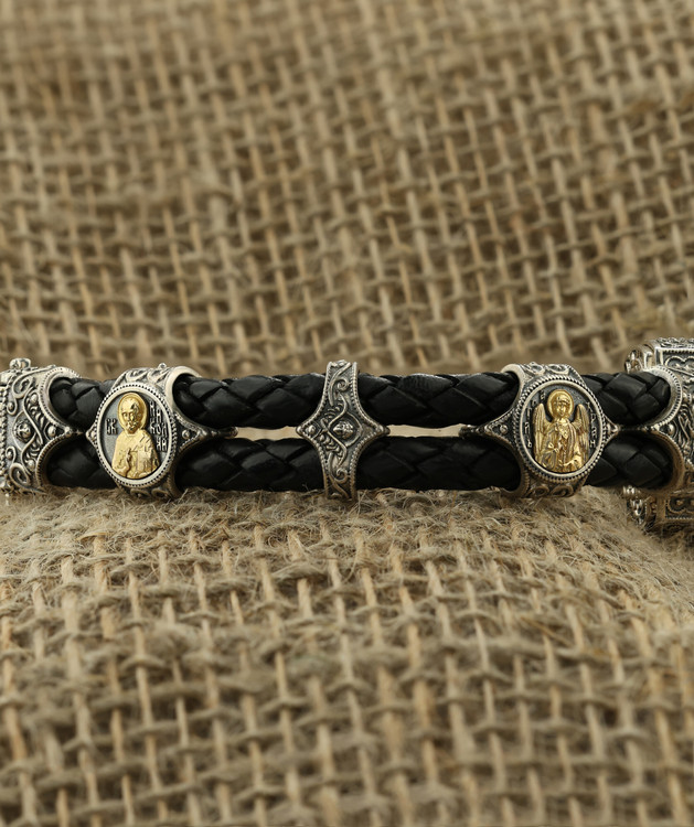 Браслет из серебра 925 пробы и золота 750 пробы c кожаным шнурком