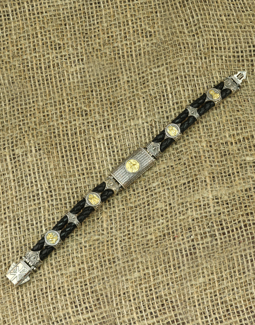 Браслет из серебра 925 пробы и золота 750 пробы c кожаным шнурком