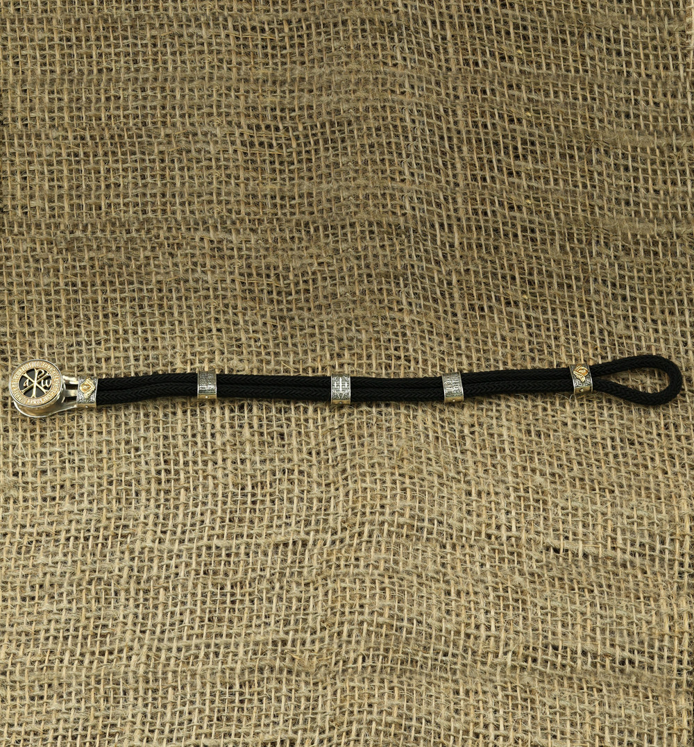 Браслет из серебра 925 пробы и золота 750 пробы c ониксом и шёлковым шнурком